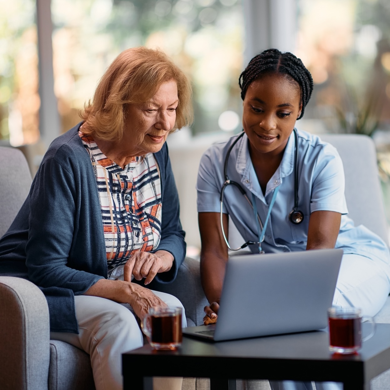 Caregiver spending quality time with a senior client